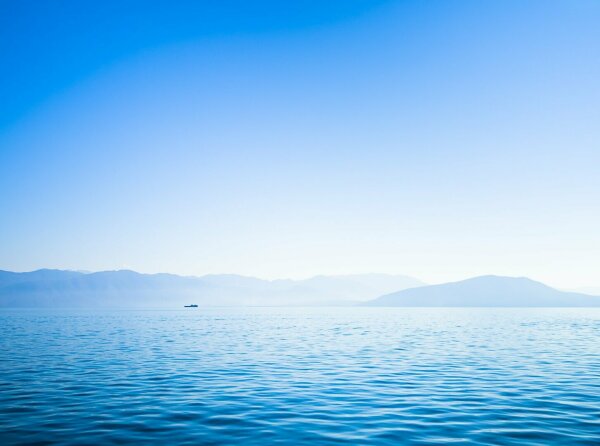 View of the ionian sea and the greek coast from a ship, early morning light